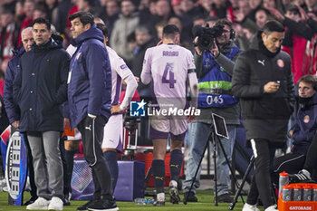 2024-11-05 - Arnau Martinez of Girona FC looks dejected after receiving a red card during the UEFA Champions League, League Phase, football match between PSV Eindhoven and Girona FC on November 5, 2024 at Philips Stadion in Eindhoven, Netherlands - FOOTBALL - CHAMPIONS LEAGUE - PSV EINDHOVEN V GIRONA - UEFA CHAMPIONS LEAGUE - SOCCER