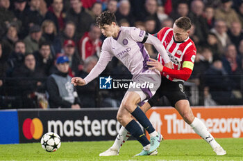 2024-11-05 - Ladislav Krejci of Girona FC battles for possession with Luuk de Jong of PSV during the UEFA Champions League, League Phase, football match between PSV Eindhoven and Girona FC on November 5, 2024 at Philips Stadion in Eindhoven, Netherlands - FOOTBALL - CHAMPIONS LEAGUE - PSV EINDHOVEN V GIRONA - UEFA CHAMPIONS LEAGUE - SOCCER