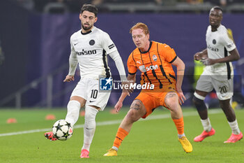 2024-11-06 - Kastriot Imeri of Young Boys Bern and Yukhym Konoplya of Shakhtar Donetsk during the UEFA Champions League, League phase, Matchday 4 football match between Shakhtar Donetsk and Young Boys Bern on 6 November 2024 at Veltins-Arena in Gelsenkirchen, Germany - FOOTBALL - CHAMPIONS LEAGUE - SHAKHTAR DONETSK V YOUNG BOYS - UEFA CHAMPIONS LEAGUE - SOCCER