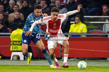 2024-03-07 - Morgan Rogers of Aston Vila FC, Tristan Gooijer of AFC Ajax during the UEFA Europa Conference League, Round of 16, 1st leg football match between AFC Ajax and Aston Villa FC on March 7, 2024 at Johan Cruijff ArenA in Amsterdam, Netherlands - FOOTBALL - CONFERENCE LEAGUE - AJAX V ASTON VILLA - UEFA CONFERENCE LEAGUE - SOCCER