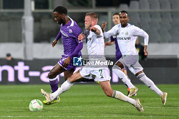 2024-03-14 - ACF Fiorentina's midfielder Jonathan Ikone against Maccabi Haifa FC's defender Daniel Sundgren - ACF FIORENTINA VS MACCABI HAIFA FC - UEFA CONFERENCE LEAGUE - SOCCER