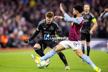 2024-03-14 - Ajax midfielder Kristian Hlynsson (38) and Douglas Luiz of Aston Villa during the UEFA Europa Conference League, Round of 16, 2nd leg football match between Aston Villa and Ajax on 14 March 2024 at Villa Park in Birmingham, England - FOOTBALL - CONFERENCE LEAGUE - ASTON VILLA V AJAX - UEFA CONFERENCE LEAGUE - SOCCER