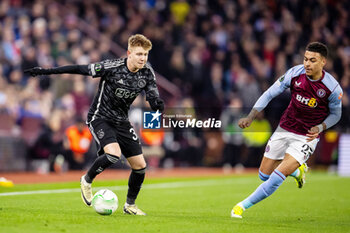 2024-03-14 - Ajax midfielder Kristian Hlynsson (38) and Morgan Rogers of Aston Villa during the UEFA Europa Conference League, Round of 16, 2nd leg football match between Aston Villa and Ajax on 14 March 2024 at Villa Park in Birmingham, England - FOOTBALL - CONFERENCE LEAGUE - ASTON VILLA V AJAX - UEFA CONFERENCE LEAGUE - SOCCER