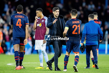 2024-04-11 - Lille coach Paulo Fonseca shakes hands with Lille midfielder Benjamin Andre (21) at full time during the UEFA Europa Conference League, Quarter-finals, 1st leg football match between Aston Villa and Losc Lille on 11 April 2024 at Villa Park in Birmingham, England - FOOTBALL - CONFERENCE LEAGUE - ASTON VILLA V LILLE - UEFA CONFERENCE LEAGUE - SOCCER