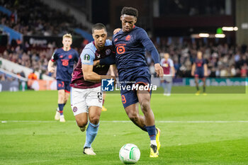 2024-04-11 - Lille forward Jonathan David (9) and Youri Tielemans of Aston Villa during the UEFA Europa Conference League, Quarter-finals, 1st leg football match between Aston Villa and Losc Lille on 11 April 2024 at Villa Park in Birmingham, England - FOOTBALL - CONFERENCE LEAGUE - ASTON VILLA V LILLE - UEFA CONFERENCE LEAGUE - SOCCER