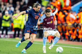 2024-04-11 - Aston Villa defender Alex Moreno (15) battles for possession with Lille midfielder Yusuf Yazici (12) during the UEFA Europa Conference League, Quarter-finals, 1st leg football match between Aston Villa and Losc Lille on 11 April 2024 at Villa Park in Birmingham, England - FOOTBALL - CONFERENCE LEAGUE - ASTON VILLA V LILLE - UEFA CONFERENCE LEAGUE - SOCCER