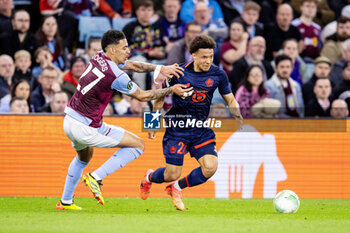 2024-04-11 - Lille defender Tiago Santos (22) and Morgan Rogers of Aston Villa during the UEFA Europa Conference League, Quarter-finals, 1st leg football match between Aston Villa and Losc Lille on 11 April 2024 at Villa Park in Birmingham, England - FOOTBALL - CONFERENCE LEAGUE - ASTON VILLA V LILLE - UEFA CONFERENCE LEAGUE - SOCCER
