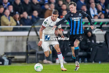 2024-04-11 - Kiril Despodov of PAOK battles for the ball with Maxim De Cuyper of Club Brugge during the UEFA Europa Conference League, Quarter-finals, 1st leg football match between Club Brugge KV and PAOK Saloniki on April 11, 2024 at Jan Breydelstadion in Brugge, Belgium - FOOTBALL - CONFERENCE LEAGUE - CLUB BRUGGE V PAOK - UEFA CONFERENCE LEAGUE - SOCCER