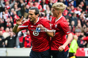 2024-04-18 - Yusuf YAZICI of Lille celebrate his goal with Hakon ARNAR HARALDSSON of Lille during the UEFA Conference League, Quarter-finals, 2nd leg football match between Losc Lille and Aston Villa on April 18, 2024 at Pierre Mauroy stadium in Villeneuve-d'Ascq near Lille, France - FOOTBALL - CONFERENCE LEAGUE - LILLE V ASTON VILLA - UEFA CONFERENCE LEAGUE - SOCCER