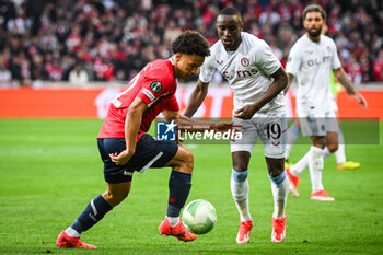 2024-04-18 - Tiago SANTOS of Lille and Moussa DIABY of Aston Villa during the UEFA Conference League, Quarter-finals, 2nd leg football match between Losc Lille and Aston Villa on April 18, 2024 at Pierre Mauroy stadium in Villeneuve-d'Ascq near Lille, France - FOOTBALL - CONFERENCE LEAGUE - LILLE V ASTON VILLA - UEFA CONFERENCE LEAGUE - SOCCER