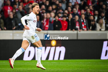 2024-04-18 - Matty CASH of Aston Villa celebrates his goal during the UEFA Conference League, Quarter-finals, 2nd leg football match between Losc Lille and Aston Villa on April 18, 2024 at Pierre Mauroy stadium in Villeneuve-d'Ascq near Lille, France - FOOTBALL - CONFERENCE LEAGUE - LILLE V ASTON VILLA - UEFA CONFERENCE LEAGUE - SOCCER