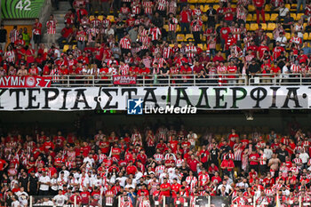 2024-05-29 - Olympiacos F.C. supporters during UEFA Europa Conference League 2024 final soccer match between Olympiacos F.C. vs. A.C.F. Fiorentina at OPAP Arena, Athens, 29th of May 2024 - FINAL - OLYMPIACOS VS ACF FIORENTINA - UEFA CONFERENCE LEAGUE - SOCCER