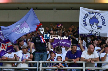 2024-05-29 - A.C.F. Fiorentina supporters during UEFA Europa Conference League 2024 final soccer match between Olympiacos F.C. vs. A.C.F. Fiorentina at OPAP Arena, Athens, 29th of May 2024 - FINAL - OLYMPIACOS VS ACF FIORENTINA - UEFA CONFERENCE LEAGUE - SOCCER