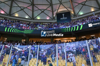 2024-05-29 - A.C.F. Fiorentina supporters during UEFA Europa Conference League 2024 final soccer match between Olympiacos F.C. vs. A.C.F. Fiorentina at OPAP Arena, Athens, 29th of May 2024 - FINAL - OLYMPIACOS VS ACF FIORENTINA - UEFA CONFERENCE LEAGUE - SOCCER