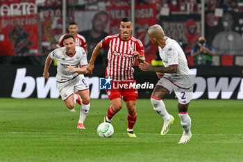 2024-05-29 - Chiquinho (Olympiacos F.C.) in action against Dodo (A.C.F. Fiorentina) during UEFA Europa Conference League 2024 final soccer match between Olympiacos F.C. vs. A.C.F. Fiorentina at OPAP Arena, Athens, 29th of May 2024 - FINAL - OLYMPIACOS VS ACF FIORENTINA - UEFA CONFERENCE LEAGUE - SOCCER