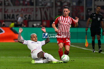 2024-05-29 - Daniel Podence (Olympiacos F.C.) in action against Dodo (A.C.F. Fiorentina) during UEFA Europa Conference League 2024 final soccer match between Olympiacos F.C. vs. A.C.F. Fiorentina at OPAP Arena, Athens, 29th of May 2024 - FINAL - OLYMPIACOS VS ACF FIORENTINA - UEFA CONFERENCE LEAGUE - SOCCER