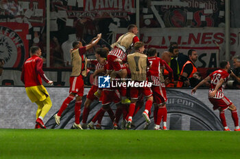 2024-05-29 - Happiness of Olympiacos F.C. team after Ayoub El Kaabi (Olympiacos F.C.) scores a goal during over time UEFA Europa Conference League 2024 final soccer match between Olympiacos F.C. vs. A.C.F. Fiorentina at OPAP Arena, Athens, 29th of May 2024 - FINAL - OLYMPIACOS VS ACF FIORENTINA - UEFA CONFERENCE LEAGUE - SOCCER