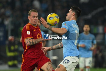 2024-01-10 - Rick Karsdorp of A.S. Roma and Alessio Romagnoli of S.S. Lazio during the quarter-final of the Frecciarossa Italian Cup between S.S. Lazio vs A.S. Roma, 10 January 2024 at the Olympic Stadium in Rome. - SS LAZIO VS AS ROMA - ITALIAN CUP - SOCCER
