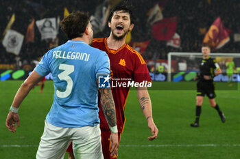 2024-01-10 - Luca Pellegrini of S.S. Lazio and Sardar Azmoun of A.S. Roma during the quarter-final of the Frecciarossa Italian Cup between S.S. Lazio vs A.S. Roma, 10 January 2024 at the Olympic Stadium in Rome. - SS LAZIO VS AS ROMA - ITALIAN CUP - SOCCER