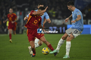 2024-01-10 - Paulo Dybala of A.S. Roma and Alessio Romagnoli of S.S. Lazio during the quarter-final of the Frecciarossa Italian Cup between S.S. Lazio vs A.S. Roma, 10 January 2024 at the Olympic Stadium in Rome. - SS LAZIO VS AS ROMA - ITALIAN CUP - SOCCER
