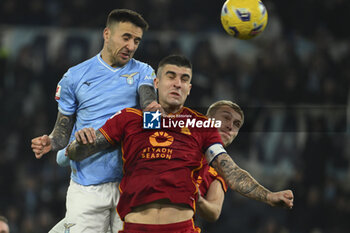 2024-01-10 - Matias Vecino of S.S. Lazio and Gianluca Mancini of A.S. Roma during the quarter-final of the Frecciarossa Italian Cup between S.S. Lazio vs A.S. Roma, 10 January 2024 at the Olympic Stadium in Rome. - SS LAZIO VS AS ROMA - ITALIAN CUP - SOCCER