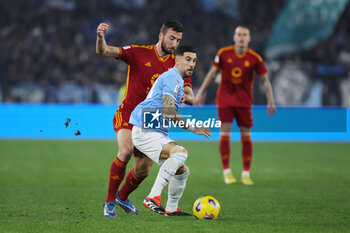 2024-01-10 - Mattia Zaccagni of Lazio vies for the ball with Bryan Cristante of Roma during the Italian Cup, Coppa Italia, quarter final football match between SS Lazio and AS Roma on January 10, 2024 at Stadio Olimpico in Rome, Italy - FOOTBALL - ITALIAN CUP - LAZIO V ROMA - ITALIAN CUP - SOCCER