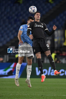 2024-04-23 - Nicolo' Casale of S.S. Lazio and Dusan Vlahovic of Juventus F.C. during the Frecciarossa Italian Cup Semi Final second leg between S.S. Lazio vs Juventus F.C. at the Olympic Stadium on April 23, 2024 in Rome, Italy. - SS LAZIO VS JUVENTUS FC - ITALIAN CUP - SOCCER