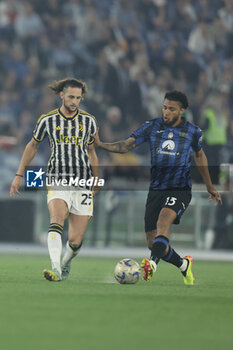 2024-05-15 - Juventus' French midfielder Adrien Rabiot challenges for the ball with Atalanta's Brazilian midfielder Ederson during the Italian Cup final football match between Atalanta and Juventus at Stadio Olimpico on May 15,2024 in Rome, Italy. - FINAL - JUVENTUS FC VS ATALANTA BC - ITALIAN CUP - SOCCER