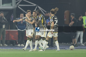 2024-05-15 - Juventus' Serbian forward Dusan Vlahovic celebrates after scoring a goal during the Italian Cup final football match between Atalanta and Juventus at Stadio Olimpico on May 15,2024 in Rome, Italy. - FINAL - JUVENTUS FC VS ATALANTA BC - ITALIAN CUP - SOCCER