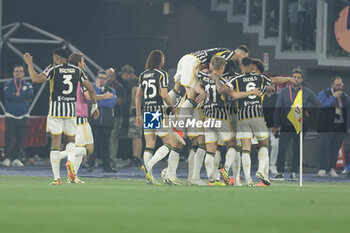 2024-05-15 - Juventus' Serbian forward Dusan Vlahovic celebrates after scoring a goal during the Italian Cup final football match between Atalanta and Juventus at Stadio Olimpico on May 15,2024 in Rome, Italy. - FINAL - JUVENTUS FC VS ATALANTA BC - ITALIAN CUP - SOCCER