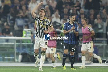 2024-05-15 - Juventus' Serbian forward Dusan Vlahovic celebrates after scoring a goal during the Italian Cup final football match between Atalanta and Juventus at Stadio Olimpico on May 15,2024 in Rome, Italy. - FINAL - JUVENTUS FC VS ATALANTA BC - ITALIAN CUP - SOCCER