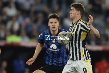 2024-05-15 - Juventus' Serbian forward Dusan Vlahovic controls the ball during the Italian Cup final football match between Atalanta and Juventus at Stadio Olimpico on May 15,2024 in Rome, Italy. - FINAL - JUVENTUS FC VS ATALANTA BC - ITALIAN CUP - SOCCER