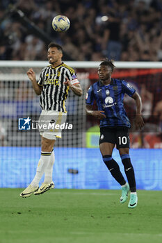 2024-05-15 - Juventus' Brazilian defender Danilo challenges for the ball with Atalanta's Malian forward El Bilal Toure during the Italian Cup final football match between Atalanta and Juventus at Stadio Olimpico on May 15,2024 in Rome, Italy. - FINAL - JUVENTUS FC VS ATALANTA BC - ITALIAN CUP - SOCCER