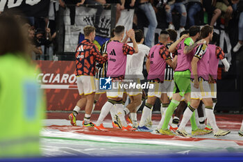 2024-05-15 - Juventus' Serbian forward Dusan Vlahovic celebrates after scoring a goal during the Italian Cup final football match between Atalanta and Juventus at Stadio Olimpico on May 15,2024 in Rome, Italy. - FINAL - JUVENTUS FC VS ATALANTA BC - ITALIAN CUP - SOCCER