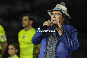 2024-05-15 - Italian singer Albano,Albano Antonio Carrisi, performs prior the Italian Cup final football match between Atalanta and Juventus at Stadio Olimpico on May 15,2024 in Rome, Italy. - FINAL - JUVENTUS FC VS ATALANTA BC - ITALIAN CUP - SOCCER