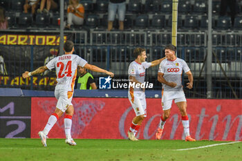 2024-08-10 - Catanzaro's Federico Bonini celebrates with teammates after scoring the 1-1 goal - EMPOLI FC VS US CATANZARO - ITALIAN CUP - SOCCER