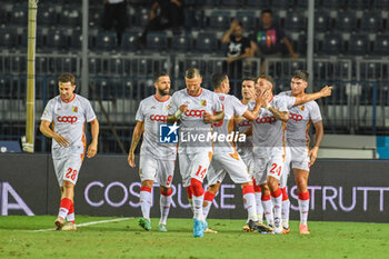 2024-08-10 - Catanzaro's Federico Bonini celebrates with teammates after scoring the 1-1 goal - EMPOLI FC VS US CATANZARO - ITALIAN CUP - SOCCER