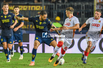 2024-08-10 - Empoli's Giuseppe Pezzella fights for the ball against Catanzaro's Mario Situm - EMPOLI FC VS US CATANZARO - ITALIAN CUP - SOCCER