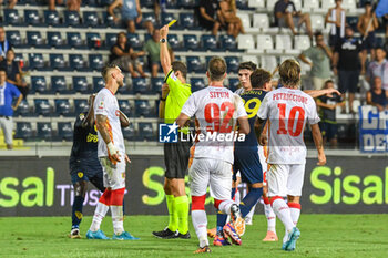 2024-08-10 - Referee Mr. Alberto Ruben Arena warns Catanzaro's Stefano Scognamiglio - EMPOLI FC VS US CATANZARO - ITALIAN CUP - SOCCER