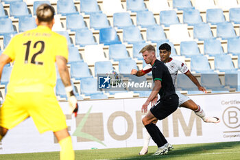 2024-08-09 - Jacopo Desogus (Cittadella) and Josh Doig (Sassuolo) - US SASSUOLO VS AS CITTADELLA - ITALIAN CUP - SOCCER