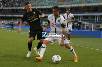 2024-08-10 - Simone Bastoni of Cesena FC competes for the ball with Tomas Suslov of Hellas Verona FC during Hellas Verona FC vs Cesena FC, round of 32° Coppa Italia Frecciarossa 2024-25, at MarcAntonio Bentegodi stadium in Verona (VR), Italy, on August 10, 2024. - HELLAS VERONA FC VS CESENA FC - ITALIAN CUP - SOCCER