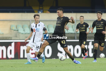 2024-08-10 - Tommaso Berti of Cesena FC competes for the ball with Diego Coppola of Hellas Verona FC during Hellas Verona FC vs Cesena FC, round of 32° Coppa Italia Frecciarossa 2024-25, at MarcAntonio Bentegodi stadium in Verona (VR), Italy, on August 10, 2024. - HELLAS VERONA FC VS CESENA FC - ITALIAN CUP - SOCCER