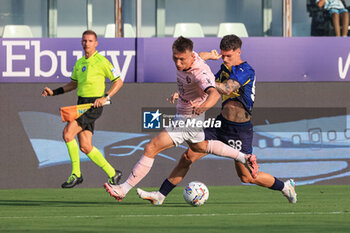 2024-08-11 - Dennis Man (Parma Calcio) in action - PARMA CALCIO VS PALERMO FC - ITALIAN CUP - SOCCER