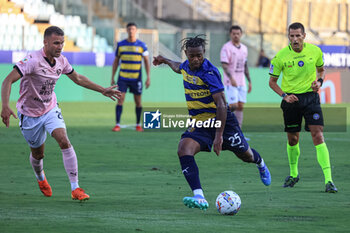 2024-08-11 - Wylan Cyprien (Parma Calcio) kicks the ball - PARMA CALCIO VS PALERMO FC - ITALIAN CUP - SOCCER