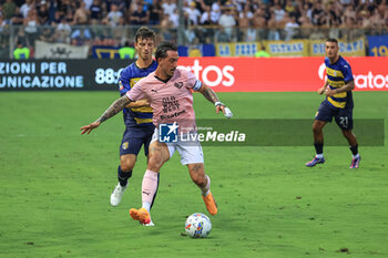 2024-08-11 - Francesco Di Mariano (Palermo FC) in action against Enrico Delprato (Parma Calcio) - PARMA CALCIO VS PALERMO FC - ITALIAN CUP - SOCCER