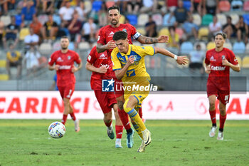 2024-08-12 - Antonio Caracciolo of Pisa Sporting Club and Marvin Cuni of Frosinone Calcio during the Frecciarossa Italian Cup round of 32 match between Frosinone Calcio vs Pisa Sporting Club at Benito Stirpe Stadium on August 12, 2024 in Frosinone, Italy. - FROSINONE CALCIO VS PISA SC - ITALIAN CUP - SOCCER