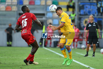 2024-08-12 - Idrissa Toure of Pisa Sporting Club and Filippo Distefano of Frosinone Calcio during the Frecciarossa Italian Cup round of 32 match between Frosinone Calcio vs Pisa Sporting Club at Benito Stirpe Stadium on August 12, 2024 in Frosinone, Italy. - FROSINONE CALCIO VS PISA SC - ITALIAN CUP - SOCCER