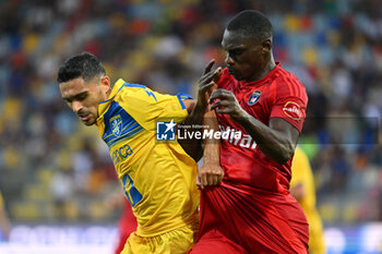 2024-08-12 - Idrissa Toure of Pisa Sporting Club and Filippo Distefano of Frosinone Calcio during the Frecciarossa Italian Cup round of 32 match between Frosinone Calcio vs Pisa Sporting Club at Benito Stirpe Stadium on August 12, 2024 in Frosinone, Italy. - FROSINONE CALCIO VS PISA SC - ITALIAN CUP - SOCCER