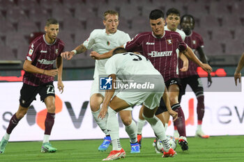 2024-08-12 - Ales Mateju of Spezia Calcio competes for the ball with Diego valencia of US Salernitana 1919 during the Soccer Italian Cup Freccia Rossa between US Salernitana 1919 vs Spezia Calcio at Arechi Stadium - US SALERNITANA VS SPEZIA CALCIO - ITALIAN CUP - SOCCER