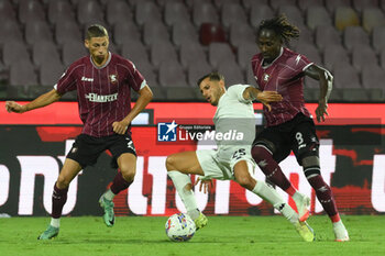 2024-08-12 - Filippo Bandinelli of Spezia Calcio competes for the ball with Mamadou Coulibaly of US Salernitana 1919 during the Soccer Italian Cup Freccia Rossa between US Salernitana 1919 vs Spezia Calcio at Arechi Stadium - US SALERNITANA VS SPEZIA CALCIO - ITALIAN CUP - SOCCER